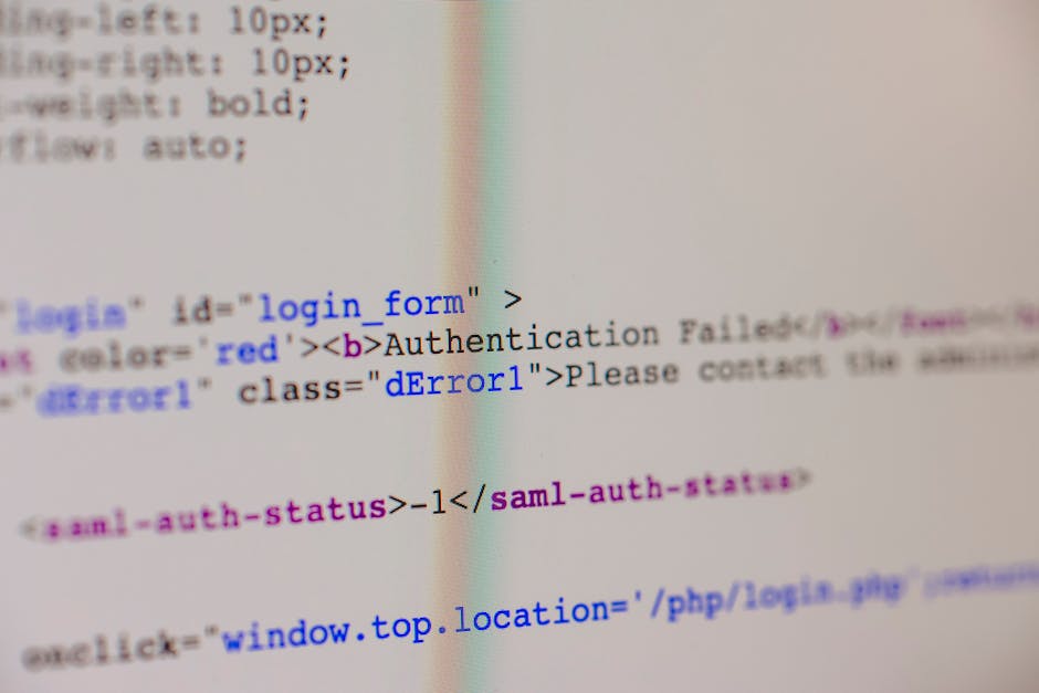 The image displays a close-up of a computer screen with HTML code visible, predominantly showing lines of text in various colors including blue, red, and purple. The code appears to be part of a web l